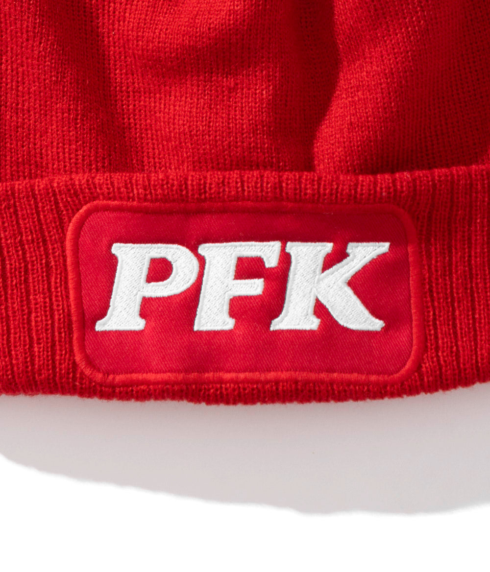 Bonnet à pompon rouge avec logo PFK